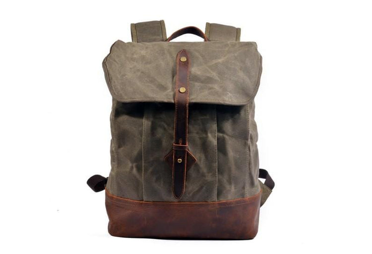 leather strap canvas backpack