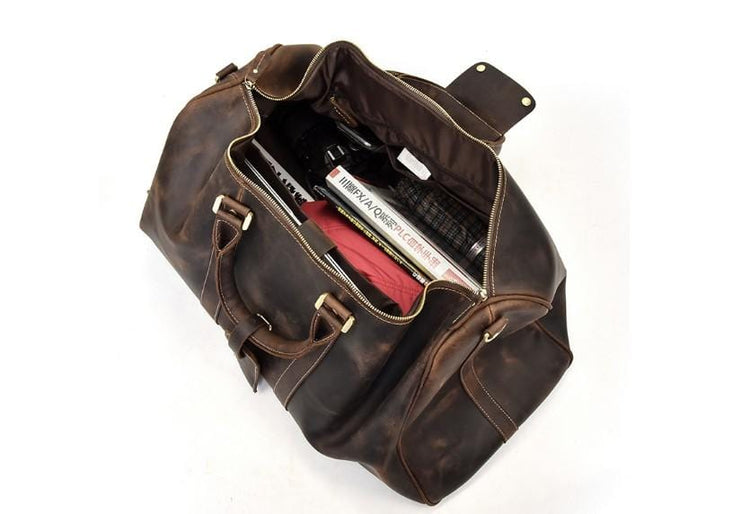 distressed brown leather luggage bag