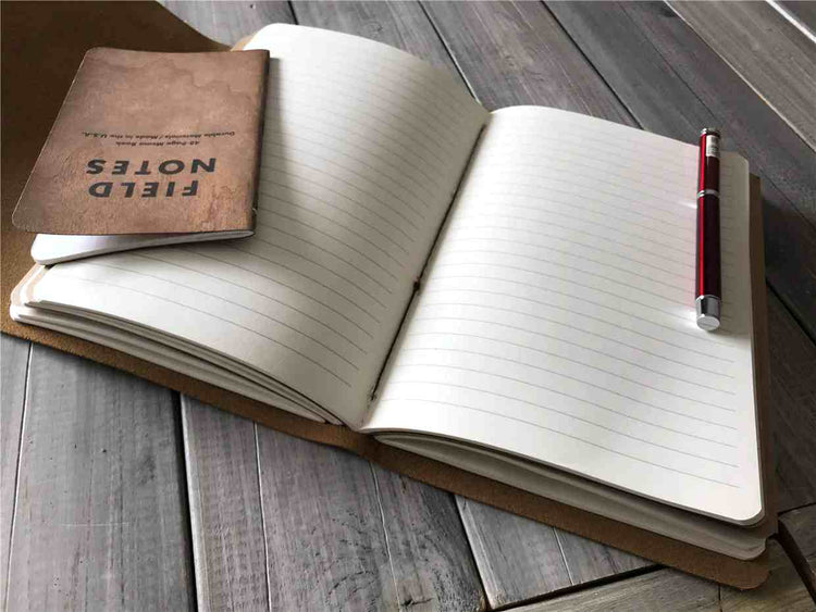 lined white leather bound notebook