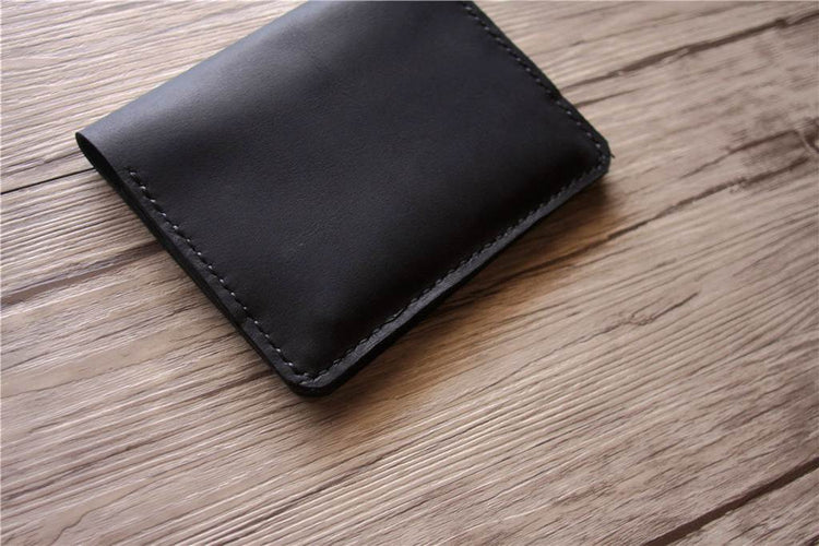 black leather passport holder
