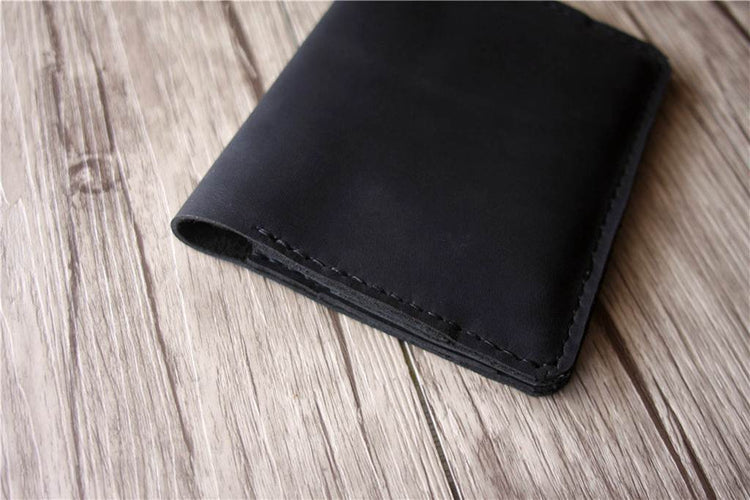 black leather passport folder