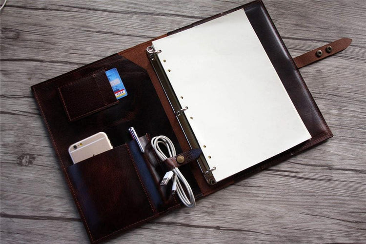 brown leather organizer with binder