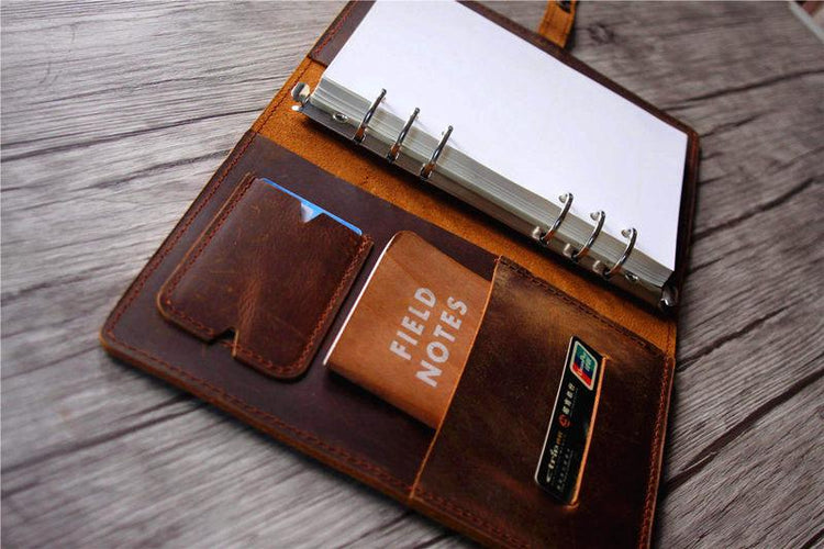brown leather portfolio notebook