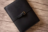 black leather designer ipad portfolio case closed with leather strap