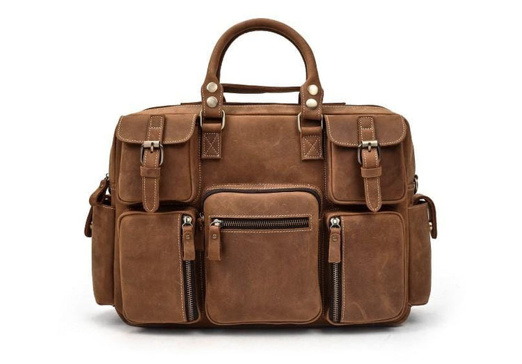 distressed light brown luggage bag