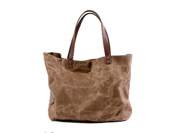 canvas and leather tote handbag