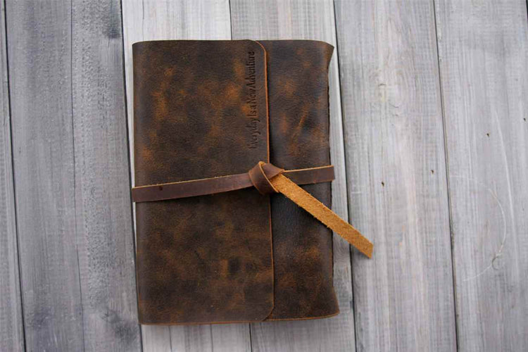 brown leather bound sketchbook