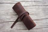 brown leather pencil sleeve roll