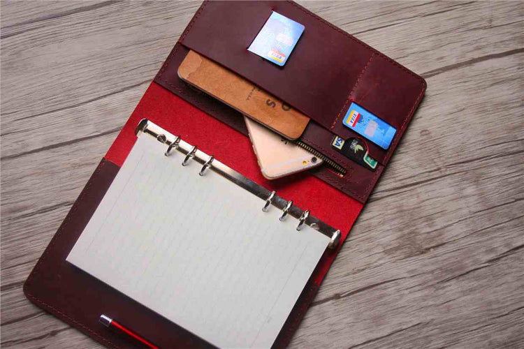 red leather binder notebook