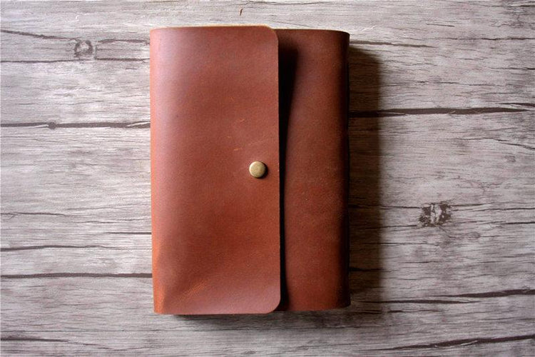 button leather notebook