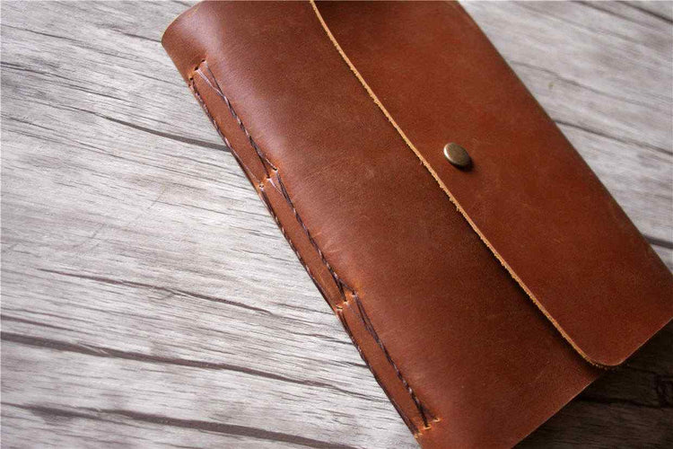 handmade leather journal with bamboo pen