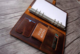 brown leather portfolio notebook