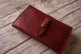 red leather passport wallet