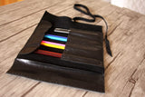 black leather pencil roll