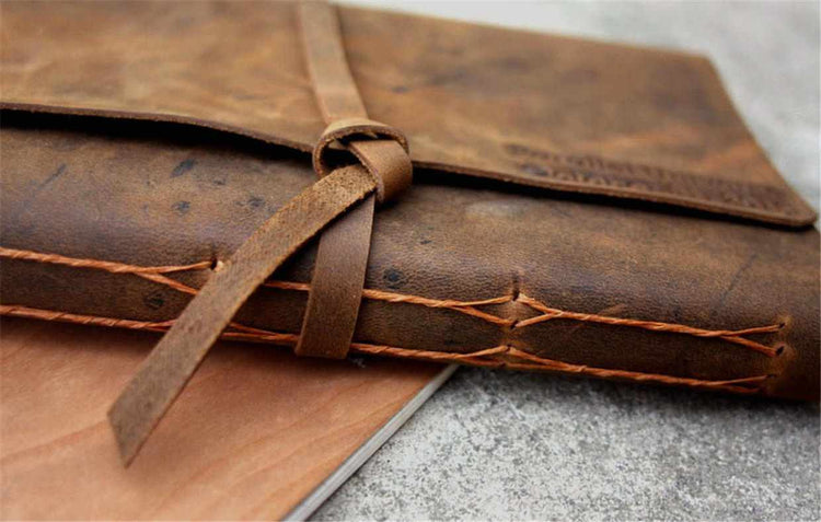 stitching of leather writing journals